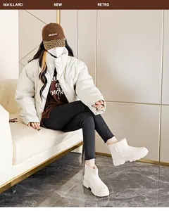 Full view of women's white snow boots with thick sole and warm fleece lining