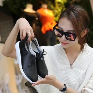 Black breathable women's nurse shoes with thick white soles for comfortable work