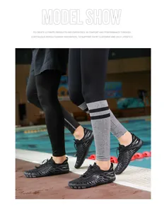 Detailed view of quick-dry black water shoes for beach and swimming by a pool.