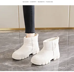 Warm women's snow boots with plush lining and thick non-slip soles in cream color