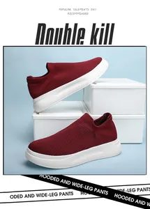 Close-up detail of breathable wine red fly-knit upper on men's slip-on sneaker