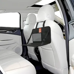 Multifunctional black car back seat organizer with a deployed folding dining tray table
