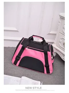 Detailed view of pink and black breathable mesh pet carrier bag for cat and dog travel