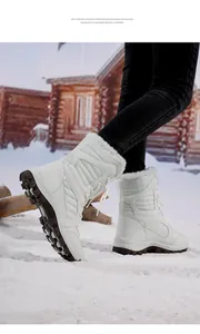 White faux fur lined mid-calf snow boots for women in winter scene