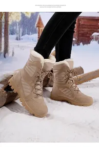 Women's warm beige mid-calf snow boots with fur lining in a winter outdoor scene