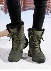 Women's warm olive green fur-lined high-top snow boots shown standing on snow detail