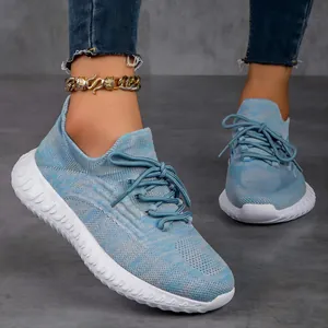 Lightweight breathable light blue fly-knit sneakers for women with white soles
