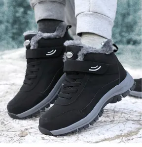 Close-up view of unisex high-top winter boots with warm fur lining and outdoor sole