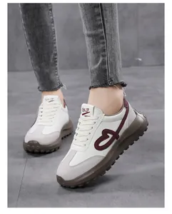 Detailed view of vintage heart embroidered off-white women's platform sneakers