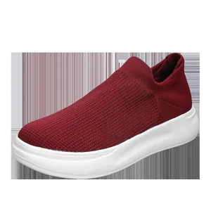 Breathable maroon knit slip-on men's casual shoes featuring comfortable white sole