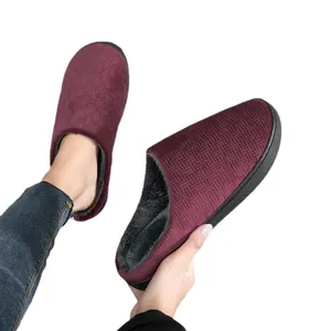 Cozy burgundy fleece-lined indoor slippers with textured upper for couples
