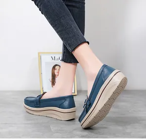 Blue wedge loafers for women with thick sole and metal buckle detail