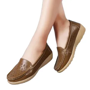 Comfortable brown women's wedge loafers with breathable hollow laser-cut patterns