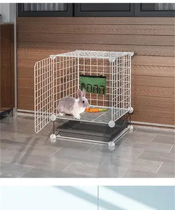 Durable green hanging hay feeder bag for rabbits inside a white wire metal pet cage