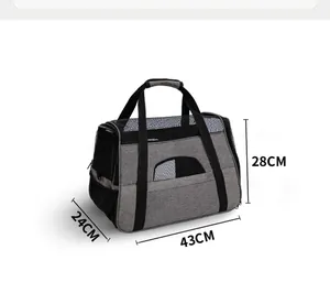 Grey portable pet carrier bag showing dimensions 43x24x28 cm with mesh breathable panels.