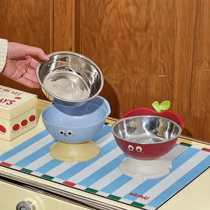 Elevated apple-shaped pet bowl with removable stainless steel liner for cats and dogs