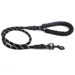 Durable black reflective dog leash with comfortable padded foam handle and metal hook.