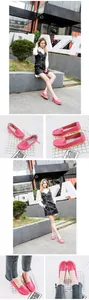 Detail views showing pink leather flat loafers with moccasin stitching and soft sole
