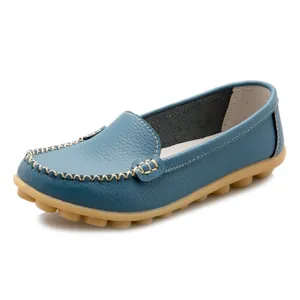 Classic blue leather loafers for women with pebbled rubber sole and white stitching