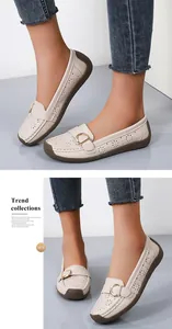 Detailed view of beige hollowed-out loafers for women featuring elegant buckle and soft sole.
