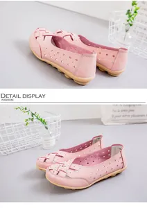 Detailed view of pink hollow-out leather loafers with a breathable bird's nest design.