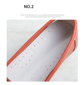 Detailed view of the breathable perforated inner lining of women's leather loafers.