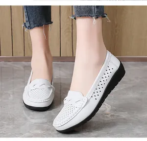 White breathable hollow-out loafers for women featuring a comfortable soft flat sole