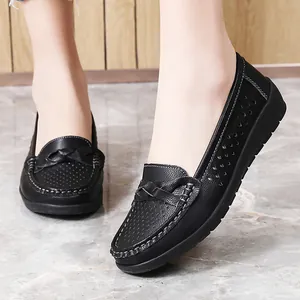 Comfortable black leather nurse loafers for women featuring non-slip flat rubber soles