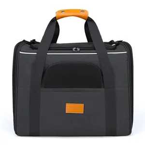 Detailed view of the foldable black pet carrier with breathable mesh window
