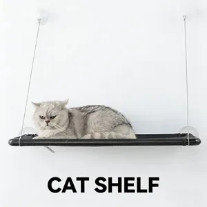 Grey cat resting on a black window-mounted cat shelf hammock with suction cups