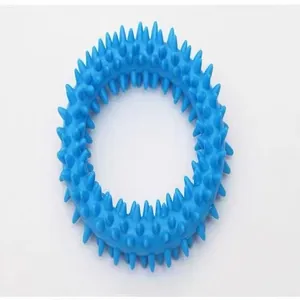 Detail showing the spikes of a blue TPR dog ring toy for teeth cleaning and play