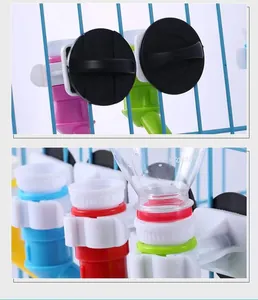Detailed view of the cage-mounted hanging pet waterer secure installation mechanism.