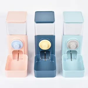 Group of three colorful automatic pet feeders for cage hanging in pink and blue colors