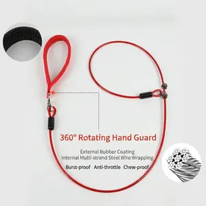 Detail view of a red dog P-leash showing the internal steel cable and padded handle.