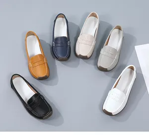 Comfortable women's loafers with rubber soles in diverse colors such as beige and navy.