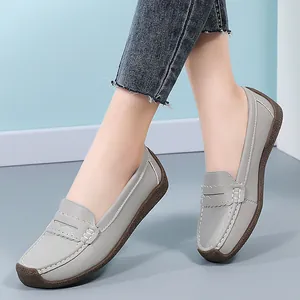 Comfortable grey leather loafers for women with soft rubber sole and contrast stitching