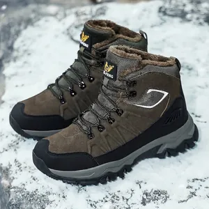Warm brown men's high-top winter outdoor hiking boots with plush lining on snow