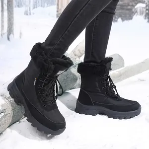 Women's winter snow boots in black featuring warm faux fur lining and rugged non-slip soles