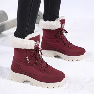 Burgundy warm lace-up snow boots with faux fur lining and non-slip thick soles