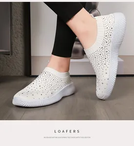 Breathable white knit sock loafers for women decorated with sparkling rhinestones
