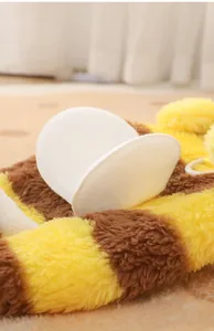 Macro detail showing the soft fuzzy texture of yellow and brown striped bee dog apparel