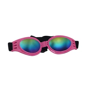 Detail view of pink foldable dog goggles with colorful UV protection reflective lenses