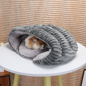 Cozy slipper-style pet bed with plush gray textured exterior and thick warm interior