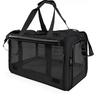 Detail view of breathable black pet carrier with mesh windows for cats and dogs