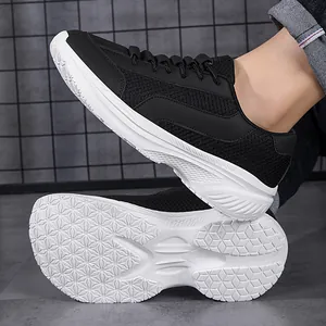 Breathable black mesh athletic sneakers with chunky white platform soles and star tread