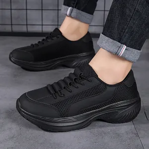 Premium black breathable casual sneakers for men featuring thick cushioned soles
