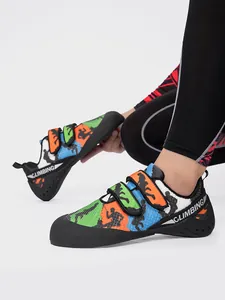 Detailed view of colorful rock climbing shoes with unique silhouette pattern and straps