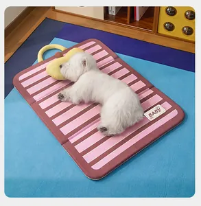 White dog sleeping on a pink striped waterproof pet cooling mat with yellow pillow