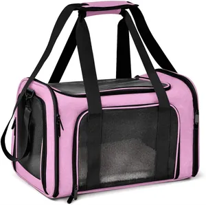 Portable pink pet carrier bag with breathable mesh windows for small dogs and cats.