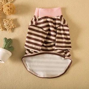 Detailed view of a soft brown striped pet t-shirt featuring a pink ribbed collar.